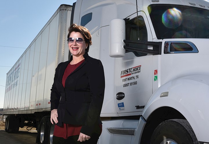 Photo of Carla Luig and semi truck